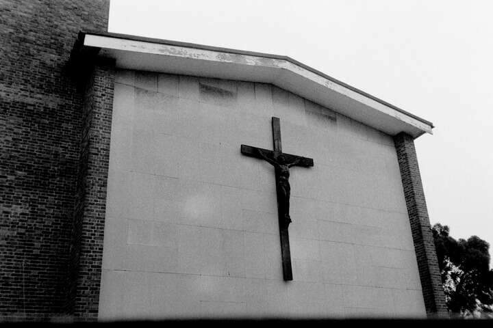 Crucifix on the side of a church.