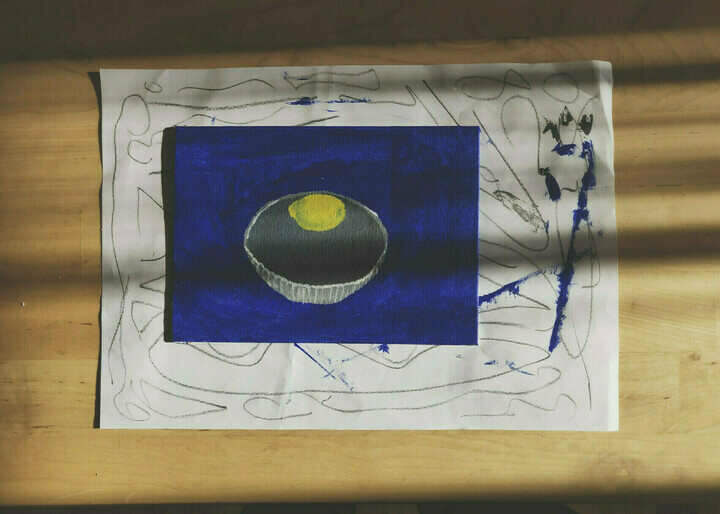 An unfinished painting of a bowl of lemons